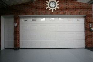 White garage door with side entrance