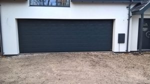 Double Hormann sectional garage door in medium rib anthracite grey
